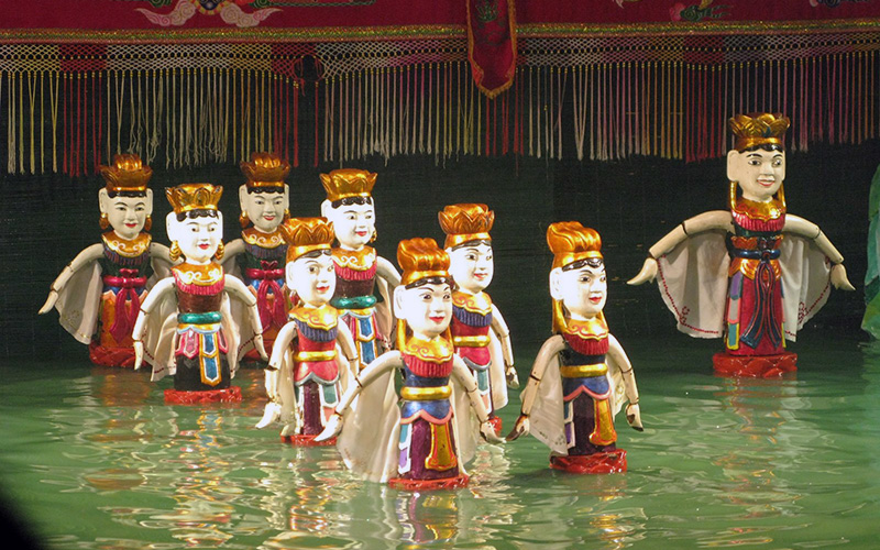 The water puppet theater - folk legends from Vietnamese history are told with wooden men, women and dragons, dancing and splashing on the face of the water.